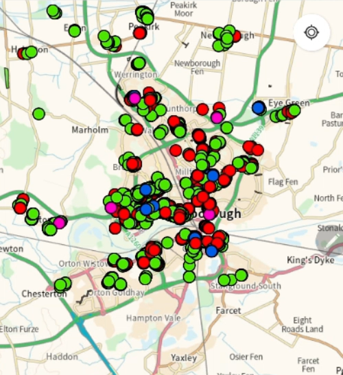 Map of Peterborough with green and red dots for trees